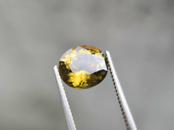 Natural Greenish Brown Sinhalite - Image 6